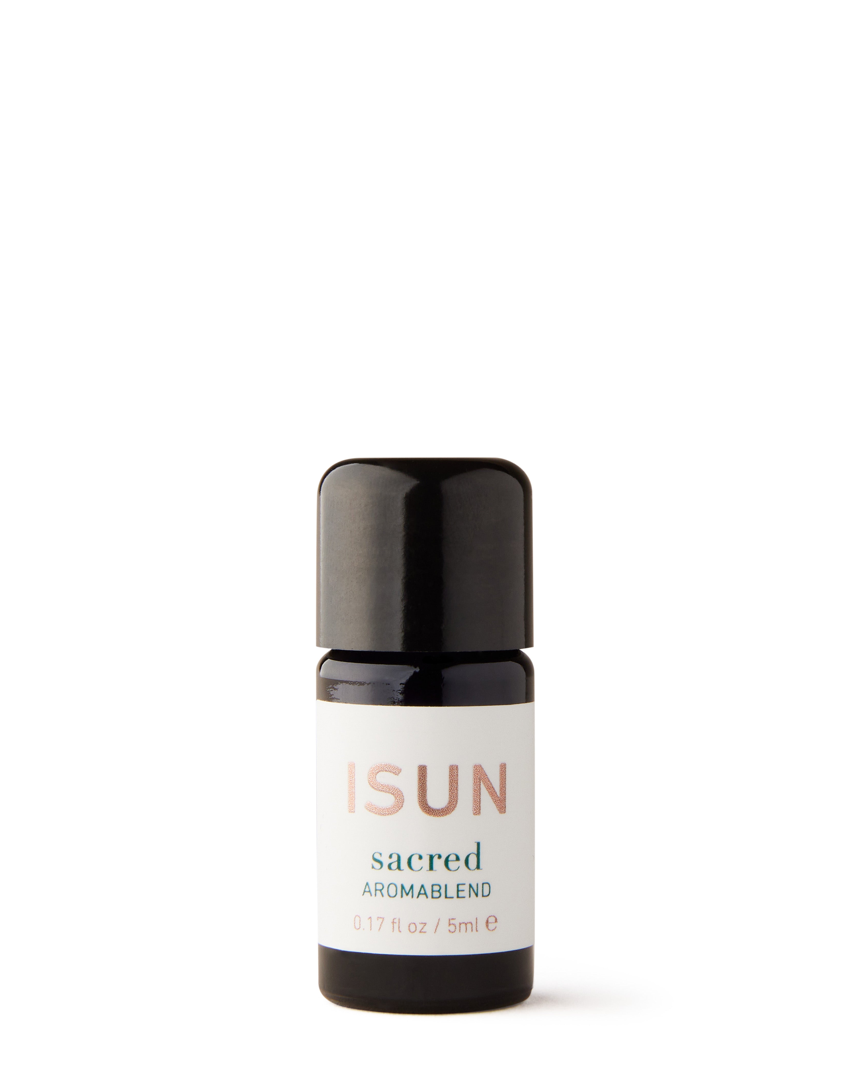 A small bottle with a black cap labeled 'ISUN sacred aromablend'.
