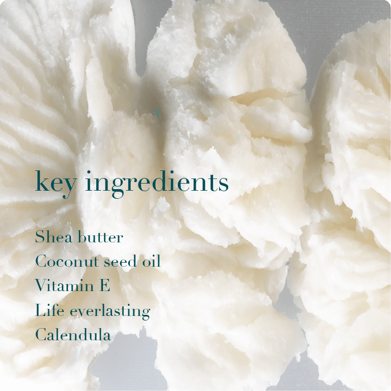 Shea butter with text listing key ingredients on a gray background