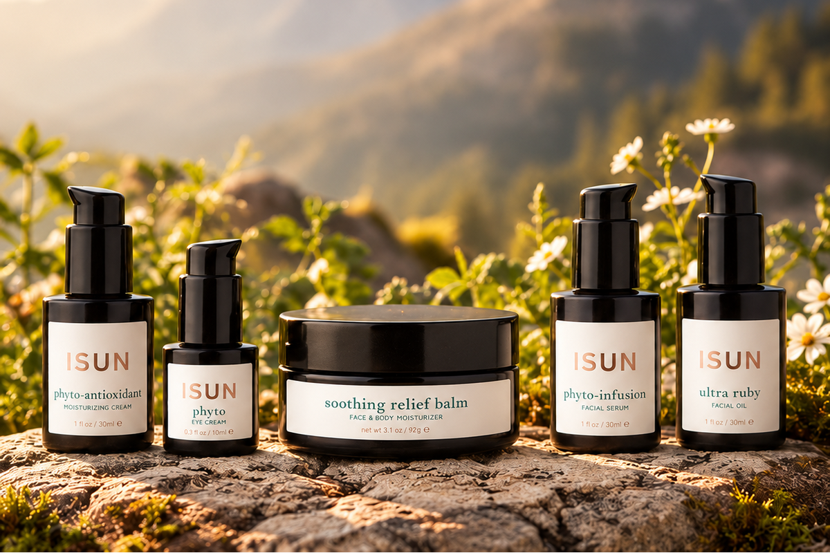 ISUN Dry and Mature Skin Ritual with five skincare products against a sunlit mountain landscape