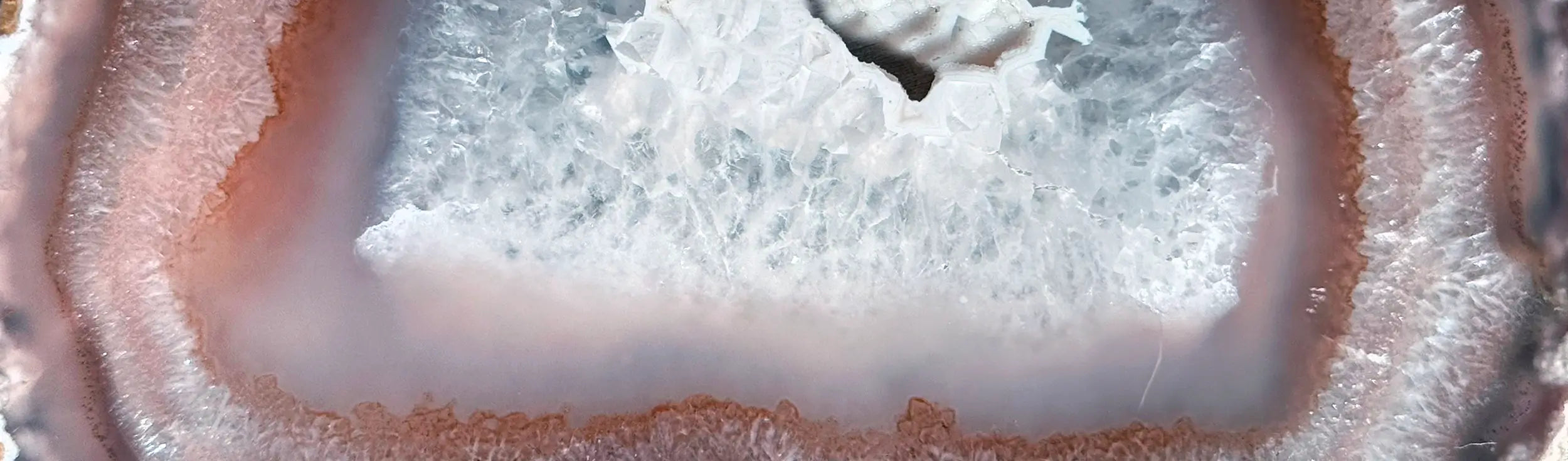 Close-up of a geode surface with a focus on patterns and colors.