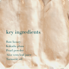 Close-up of a smooth, beige cream with text listing key ingredients.