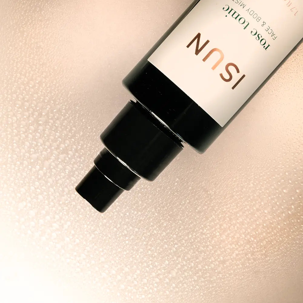 ISUN skincare bottle on a textured beige background