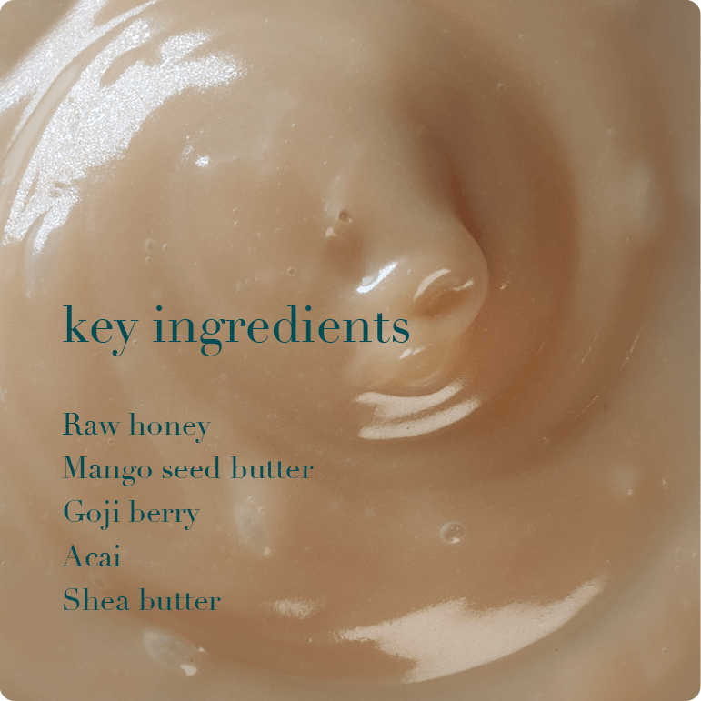 Close-up of a smooth, beige texture with text listing key ingredients.