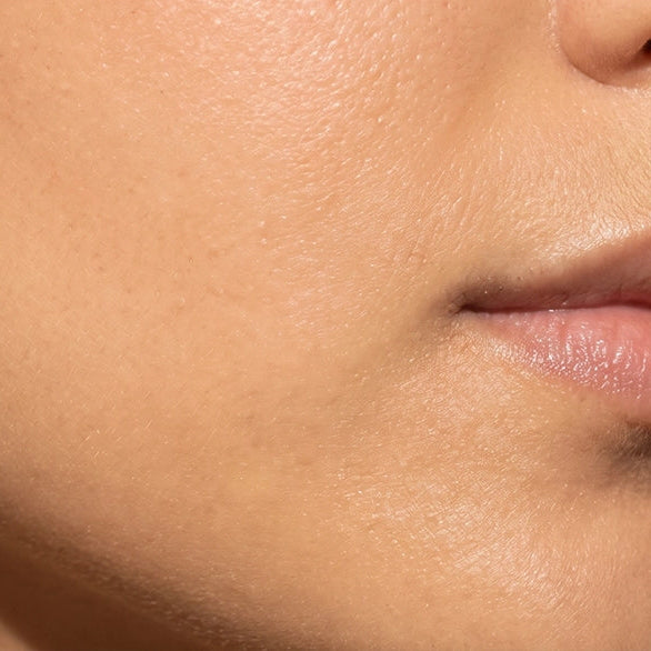 Close-up of smooth, hydrated facial skin