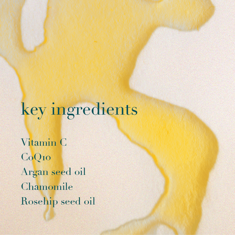 Golden oil and text listing key ingredients on a beige background