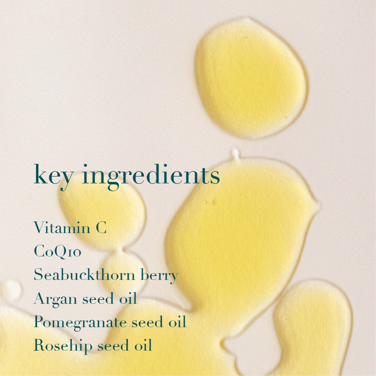 Yellow oil droplets on a light background with text listing key ingredients.
