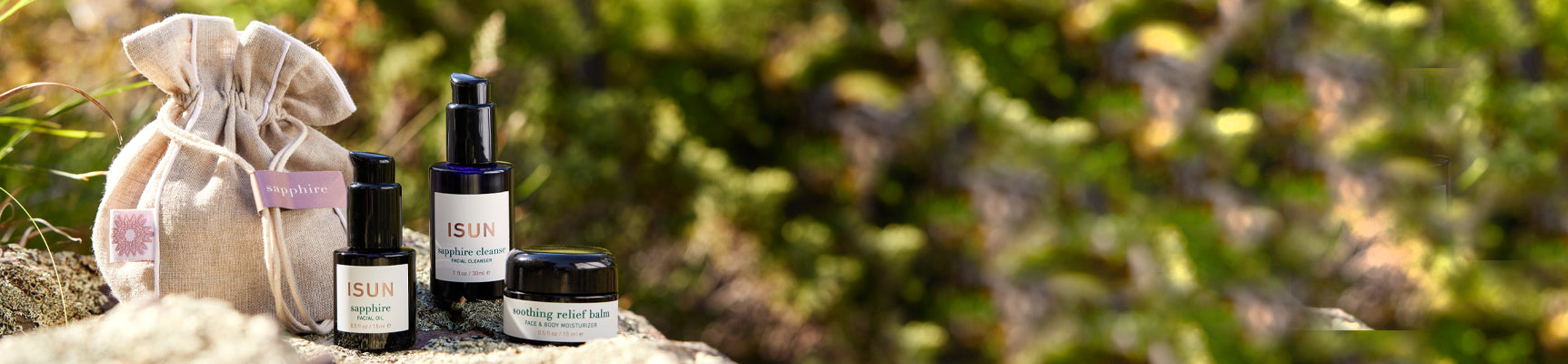 Cosmetic products on a stone surface with a natural background
